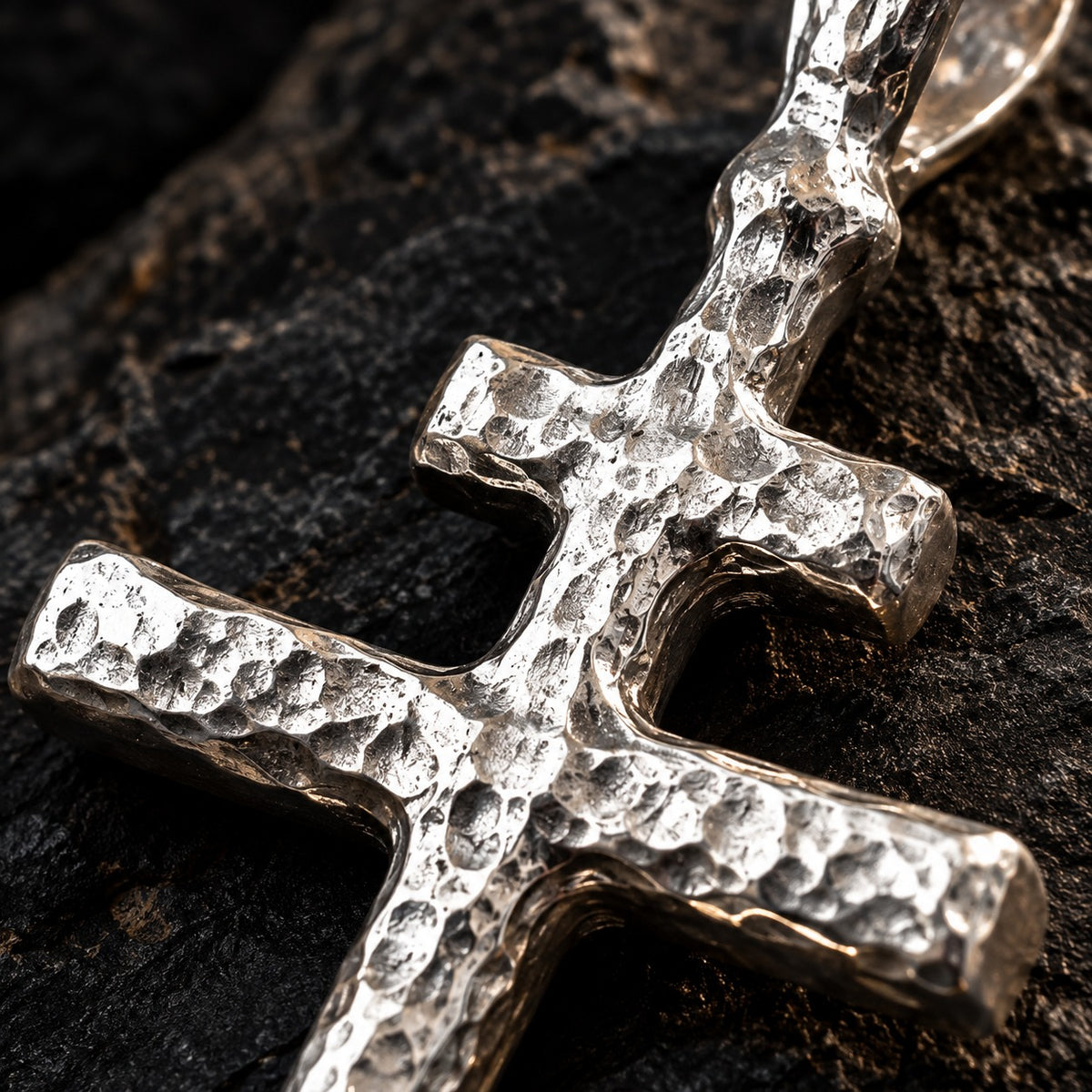 Close-up of the silver Orthodox Cross Pendant's hammered texture and bail