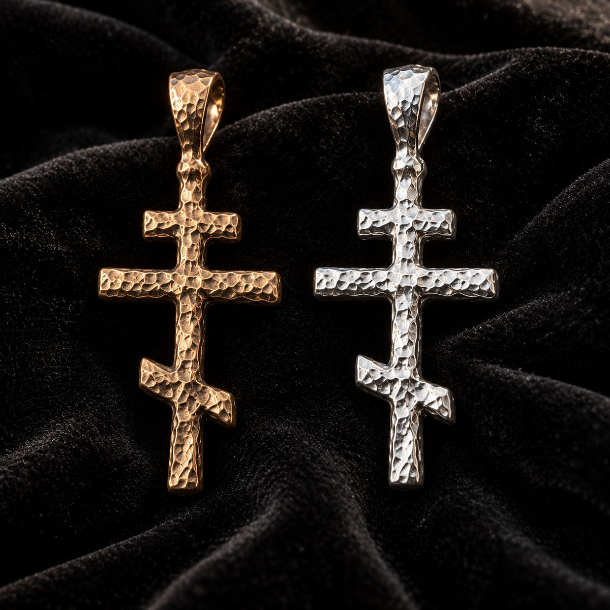 Orthodox Cross Pendant in silver and in bronze, side by side on black velvet